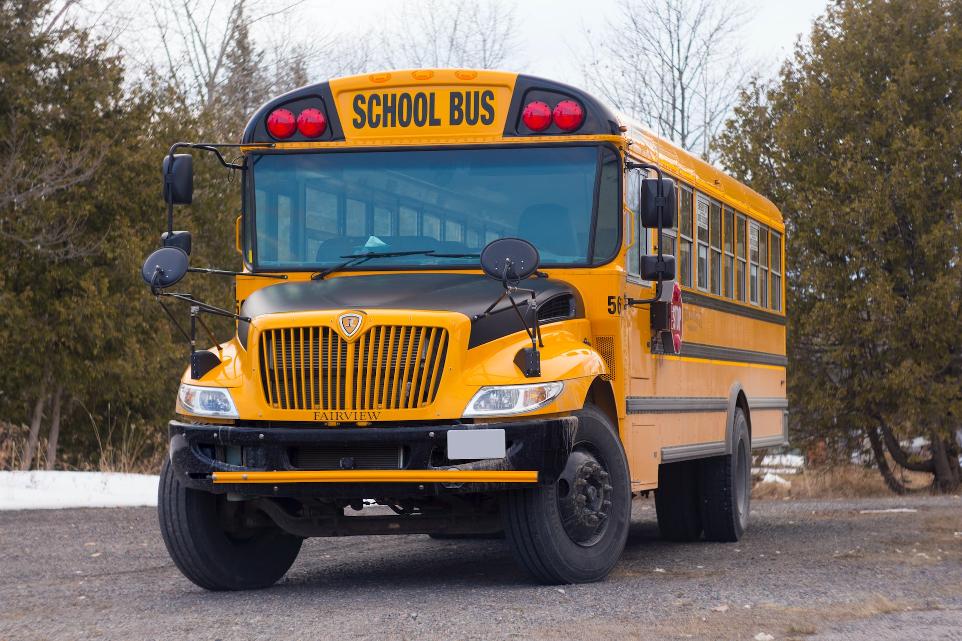 yellow school bus on road